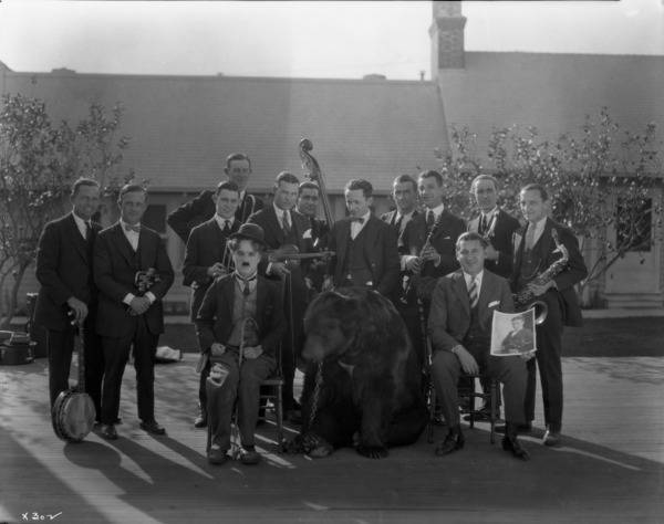 Chaplin, a bear, and the Abe Lyman Orchestra during production of The Gold Rush